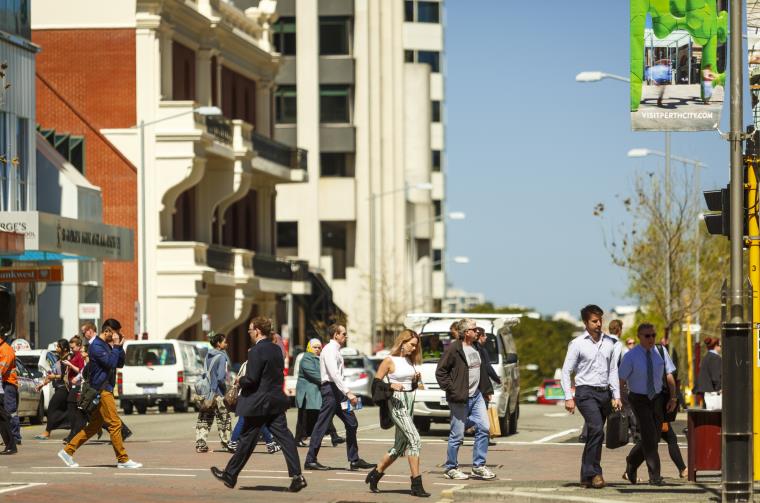 People crossing William Street in the city of Perth