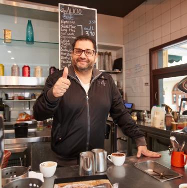 Barista giving thumbs up at Alico Cafe