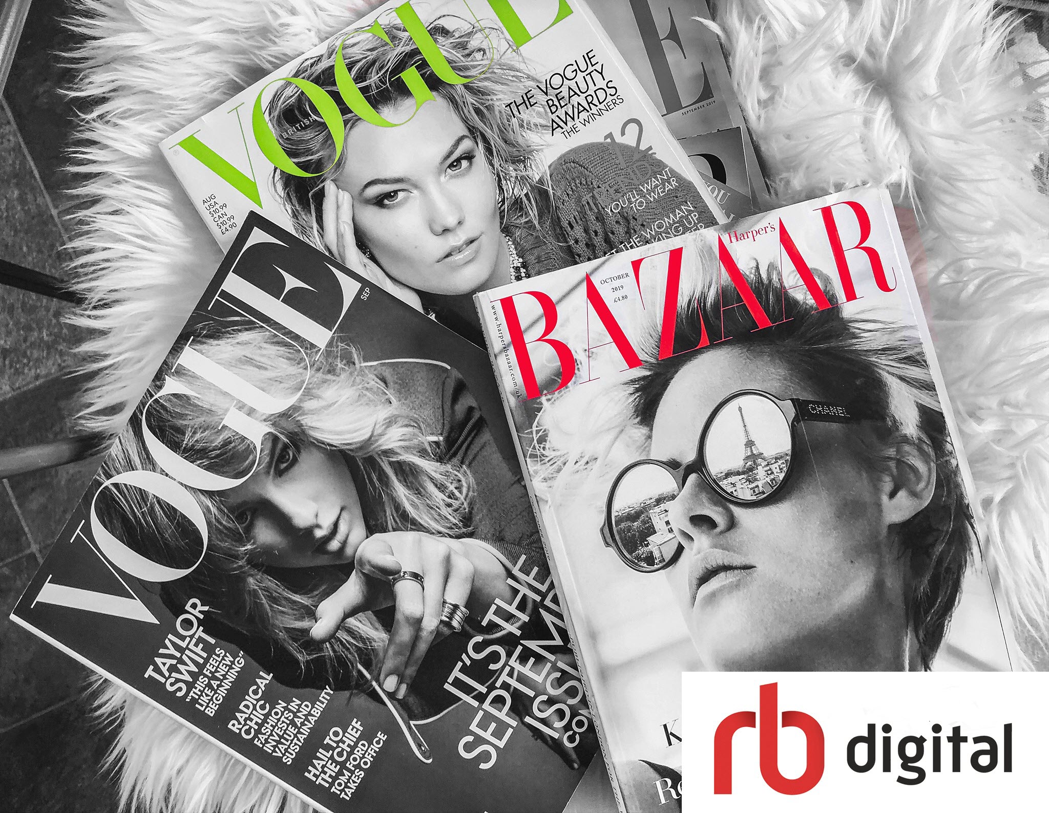 Pile of magazines with RB Digital logo