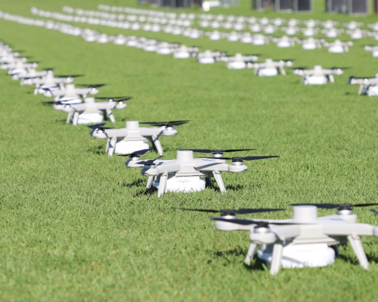 300 drones on grass 