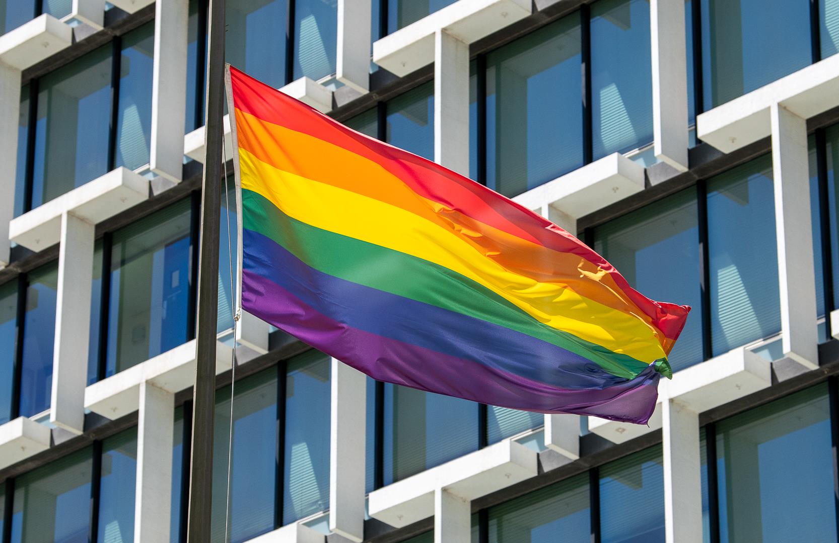 Rainbow flag in front of building
