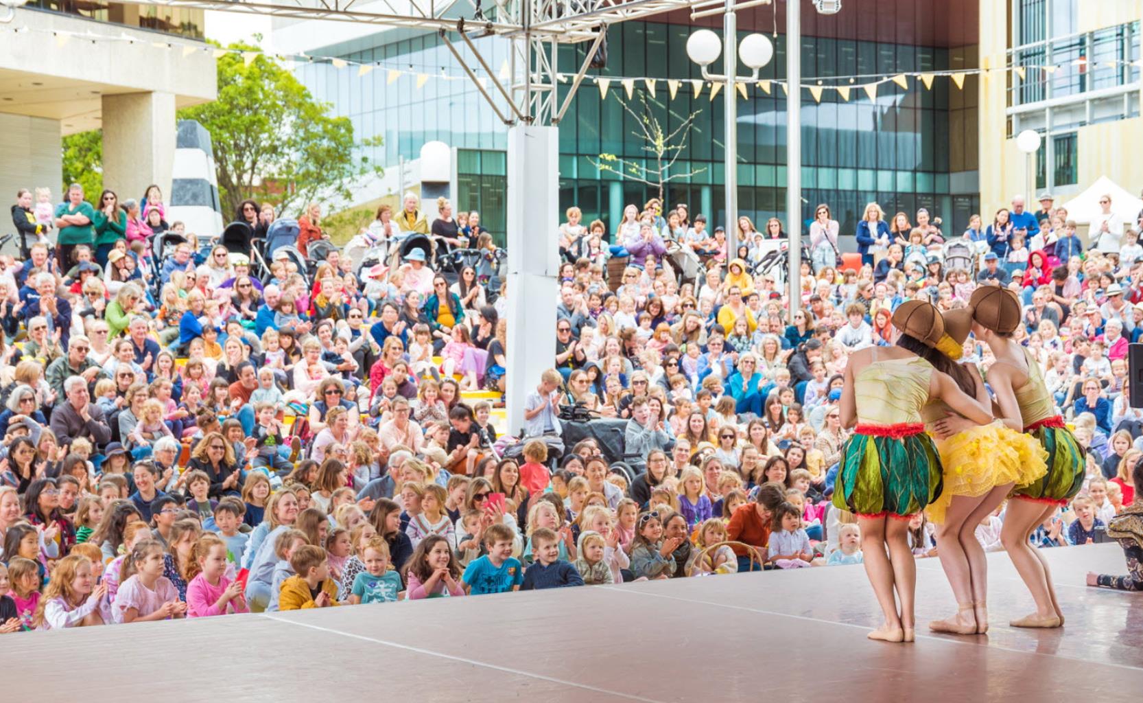 Children performing to a crowd