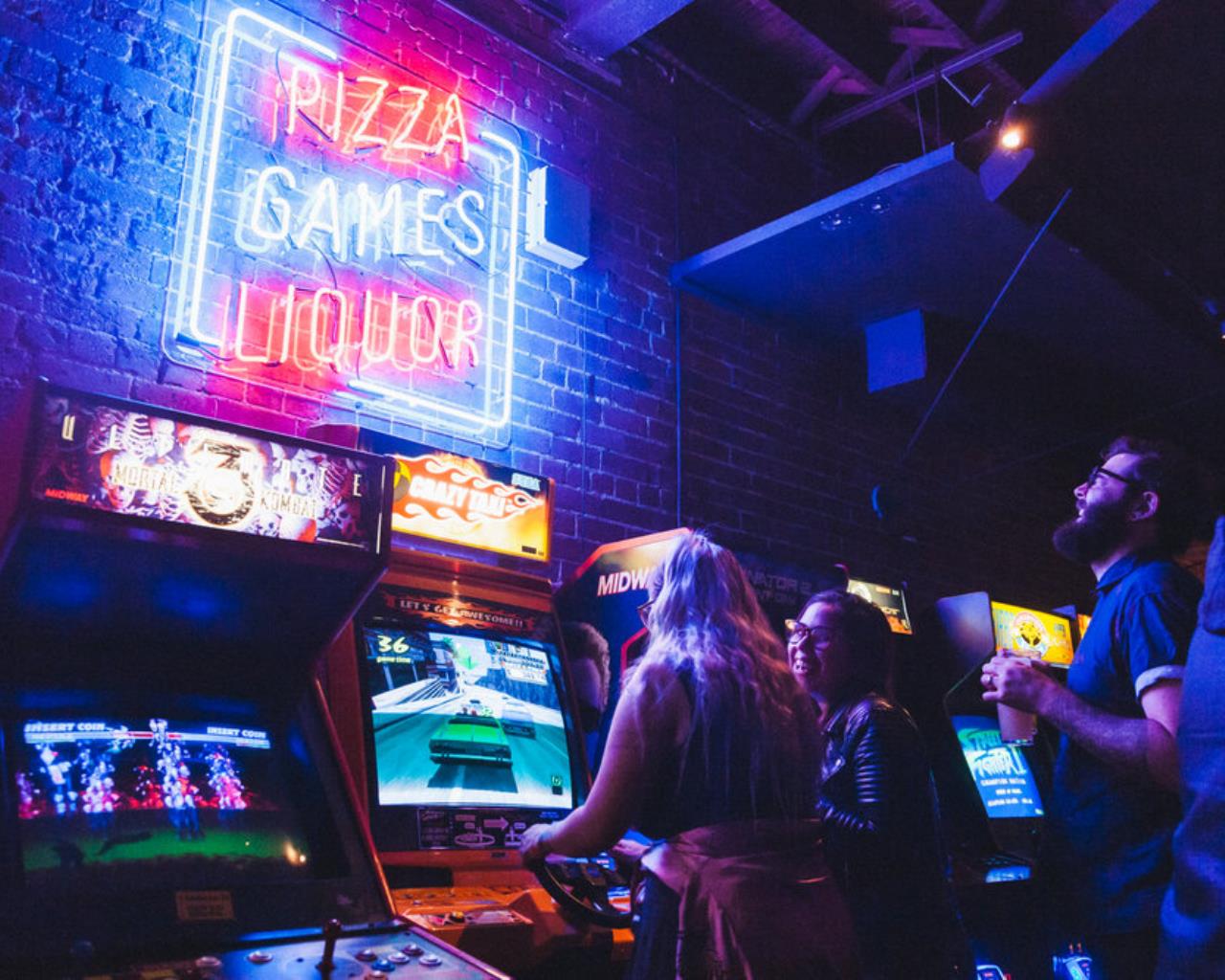Game screens and neon signs