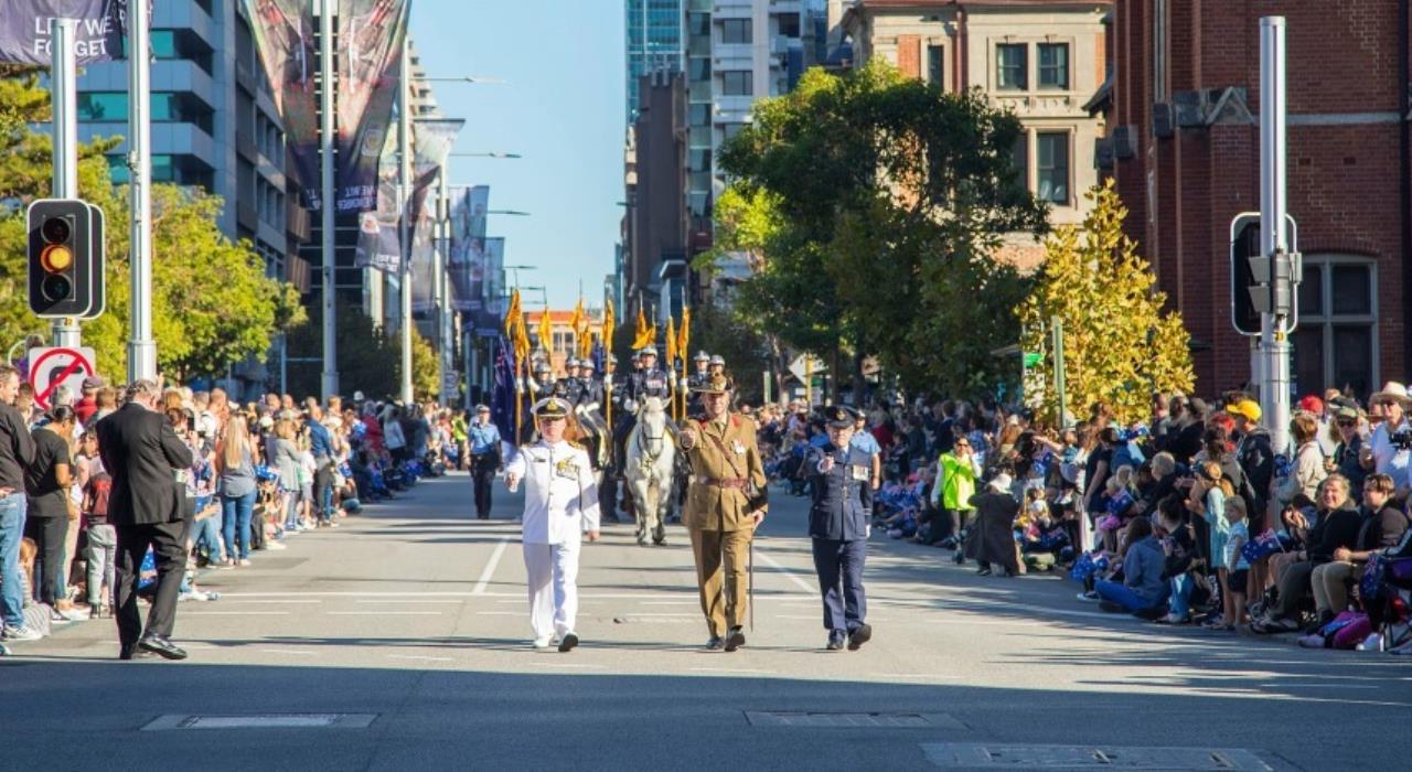 veterans marching down the street at the Anzac day march
