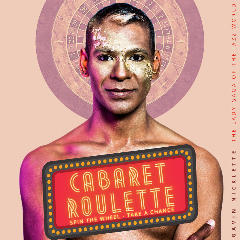 Square image of Gavin Nicklette, shirtless with a 'Cabaret Roulette' sign on their chest and glitter on their face
