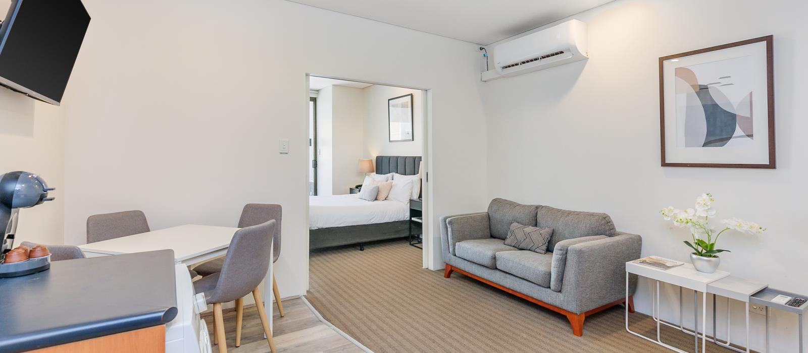 Lounge and Bedroom from kitchen - Superior Two Bedroom Serviced Apartment - All Suites Perth