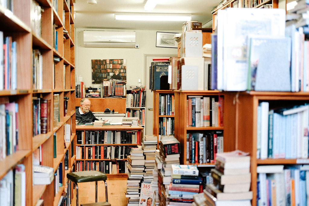 A photo of Dennis Moore in the Mainly Books store. Photograph by Emma Pegrum.